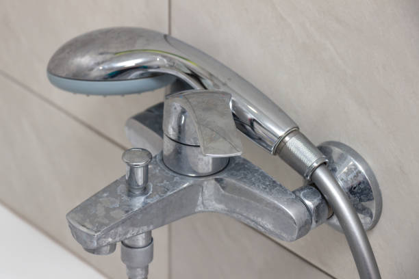 istock Plumbing fixtures cleaning process from limescale 1166511785