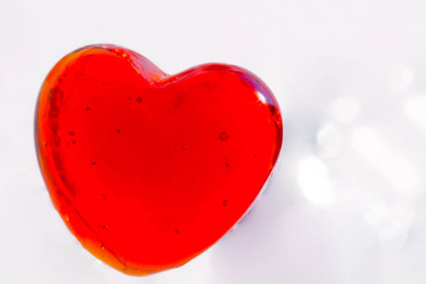 3d render of pink neon heart frame on a pastel blue background for Valentines Day