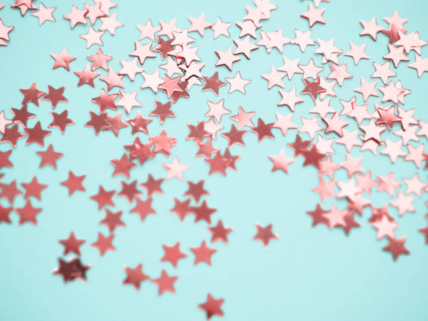 istock Golden stars glitter on blue background 1166511943