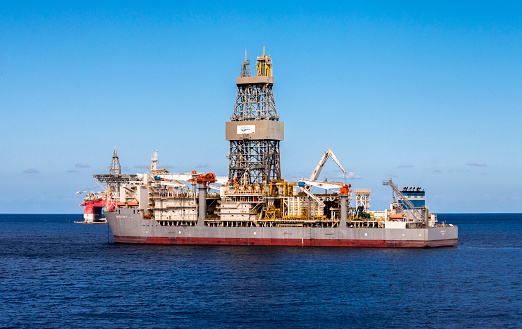 May 2017, Tenerife, Canary Islands, Spain:
ENSCO deepwater drilling ship with a dual derrick in Atlantic ocean near Tenerife island