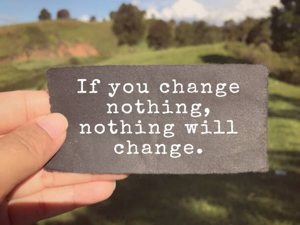 Motivational and inspirational wording. If You Change Nothing, Nothing Will Change written on a paper. Blurred vintage styled background. encouragement photos stock pictures, royalty-free photos & images