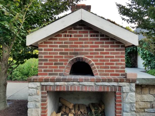 istock Wood fired brick pizza oven outdoors 1166527918