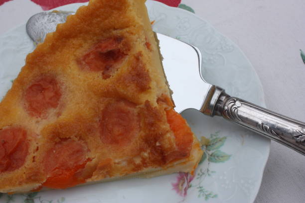 istock Clafoutis with apricots  Portion served with a pie shovel 1166527957