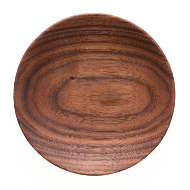 istock Handmade walnut wooden plate 1166528948