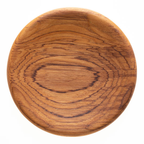 istock Handmade teak wood plate, teak wood texture. 1166529023