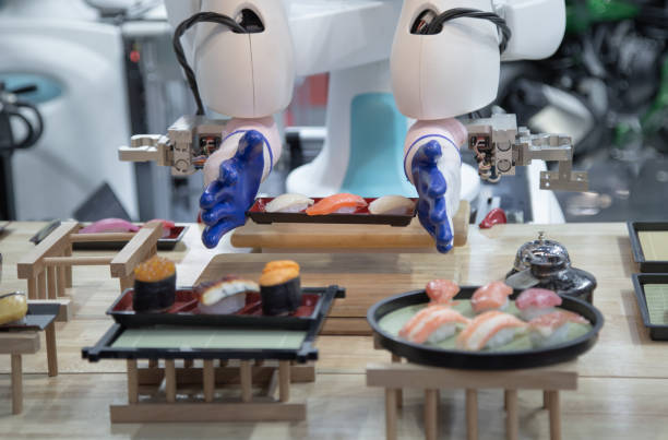 roboter, der sushi herstellt - sushi japan restaurant food stock-fotos und bilder