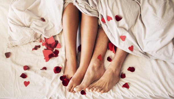 the sexiest day of the year - romance sensuality couple bed imagens e fotografias de stock