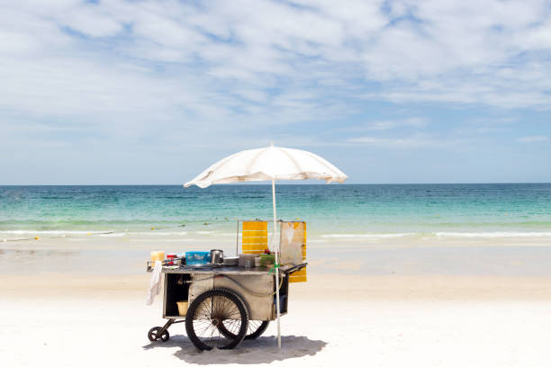 Cart selling roti snack on the beautiful beach in sunny day. Cart selling roti snack on the beautiful beach in sunny day; popular street snack in Thailand cuba market stock pictures, royalty-free photos & images