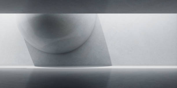 istock Abstract of concrete interior space with sun light cast the shadow on the wall and floor,Sphere structure design,Perspective of brutalism  architecture,3d rendering 1166541070