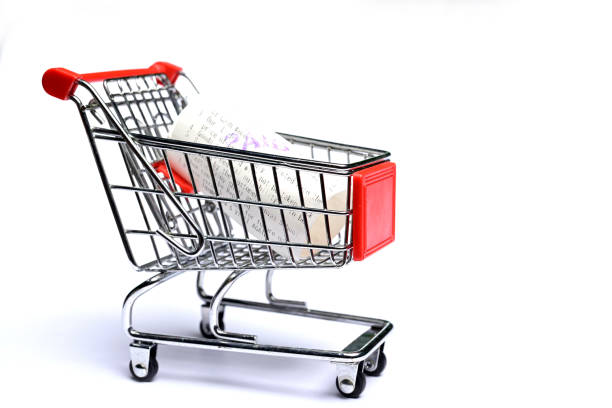 istock Shopping cart with receipt 1166543367