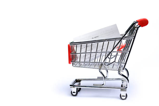 istock Shopping cart with receipt 1166543383