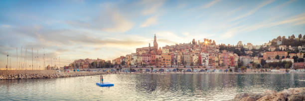 istock Public beach of Menton old town at sunset 1166545923