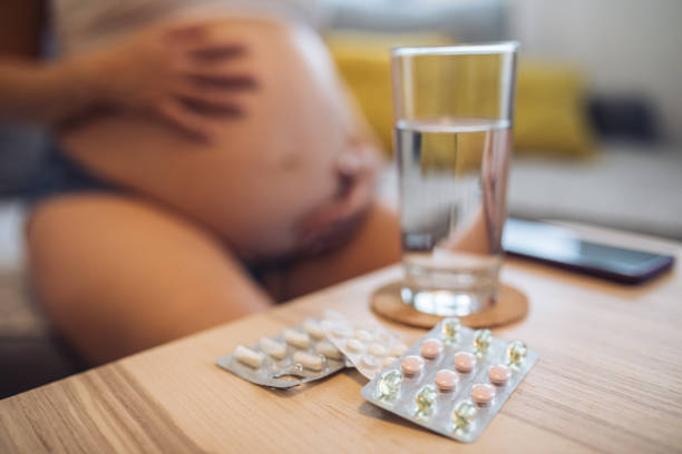 istock Pregnant woman fighting her illness 1166547532