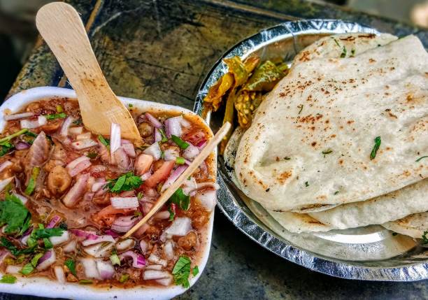 istock Spicy Indian dish Chhole Kulchhe 1166547679