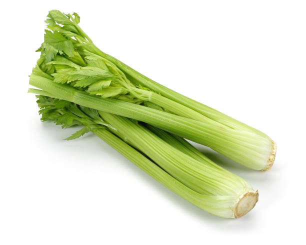istock Fresh celery stalks and leaves isolated on white 1166547775