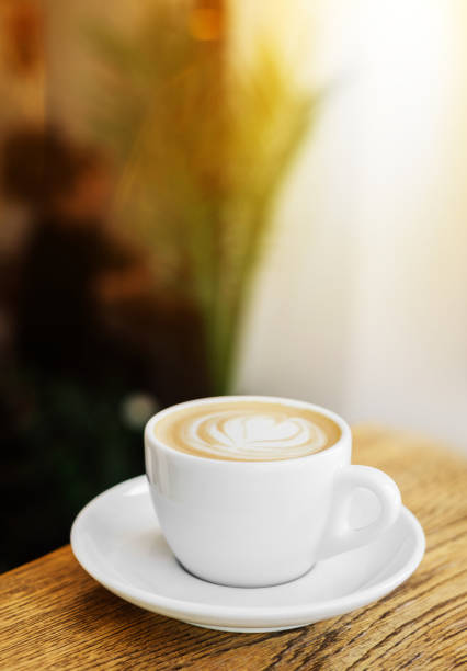 istock a cup of tasty and fresh cappuccino on the table 1166548565