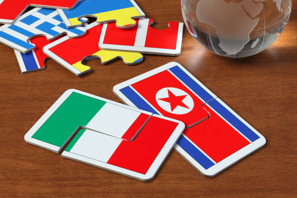 istock Italy and North Korea Flags in puzzle 1166548746