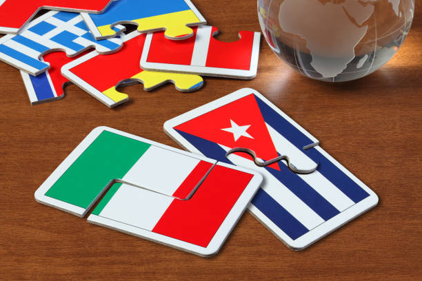 istock Italy and Cuba Flags in puzzle 1166548842