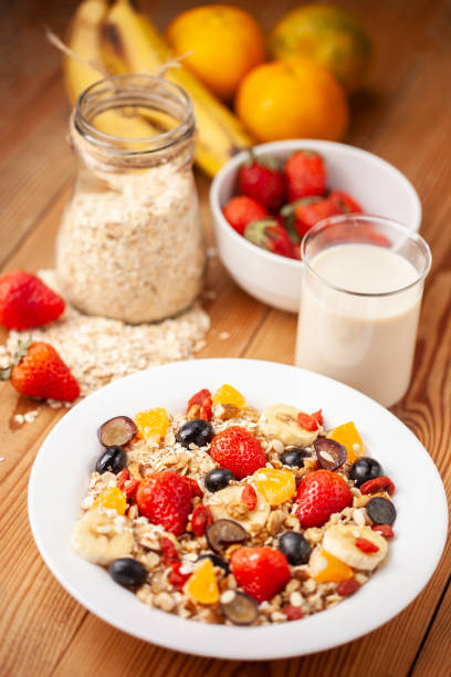 istock Healthy oats breakfast with various fruit toppings and soy milk. 1166551701