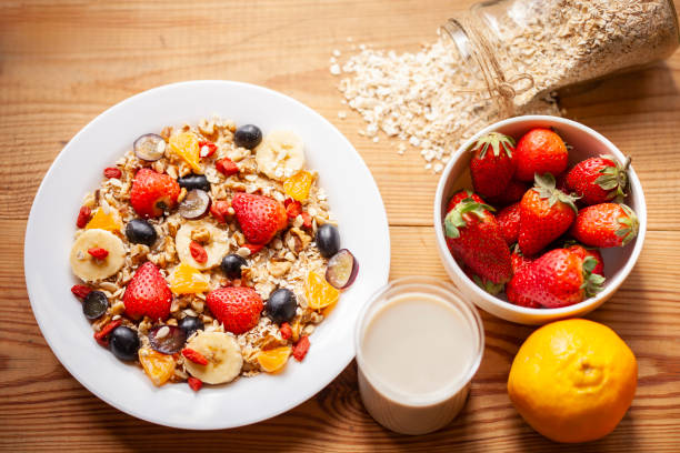 istock Healthy oats breakfast with various fruit toppings and soy milk. 1166552434