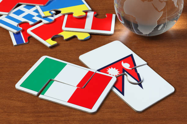 istock Italy and Nepal Flags in puzzle 1166553518