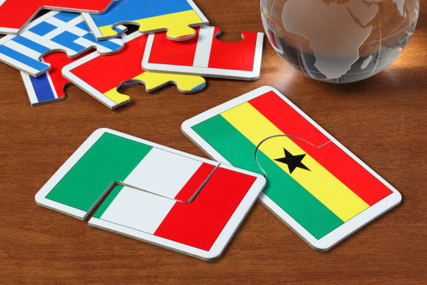 istock Italy and Ghana Flags in puzzle 1166553670