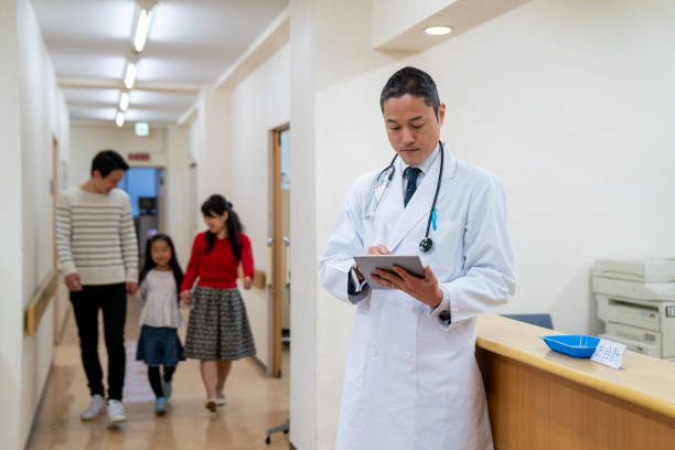 istock Doctor checking a digital tablet in a hospital 1166553989