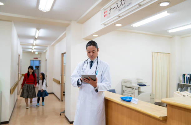 istock Doctor checking a digital tablet in a hospital 1166554036