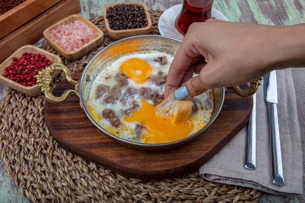 istock Turkish cuisine, Fried egg with meat - eggs with kavurma. 1166555872