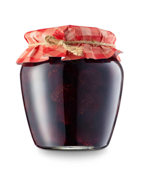 istock strawberry jam in jar isolated 1166557278