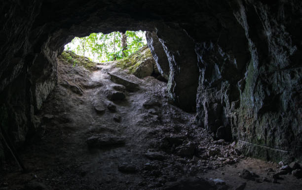 istock Light at the end of the tunnel: exit from the cave 1166557406