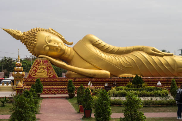 istock sleeping buddha statue at Wat Pha That Luang Temple in Vientiane, Laos 1166558592