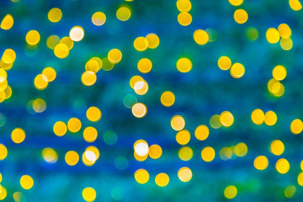 istock golden bokeh with green background 1166558885