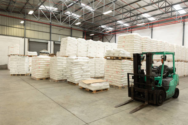 istock Interior view of forklift and goods in warehouse 1166560124