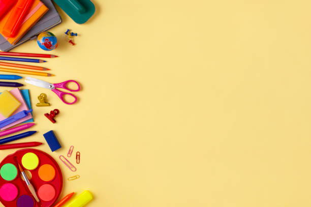 istock School Supplies on Yellow Background 1166560646