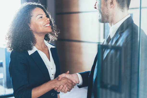 istock Business people shaking hands 1166566316