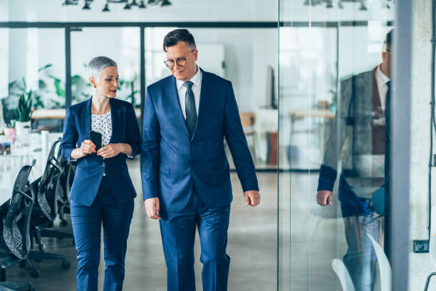 istock Business partners in discussion 1166566322