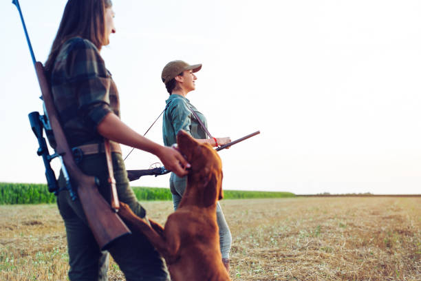 istock Women hunters with hunting dog 1166569506
