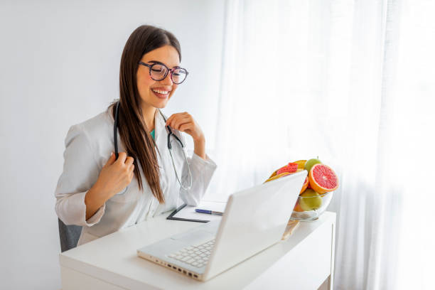 istock Smiling nutritionist in her office 1166572234