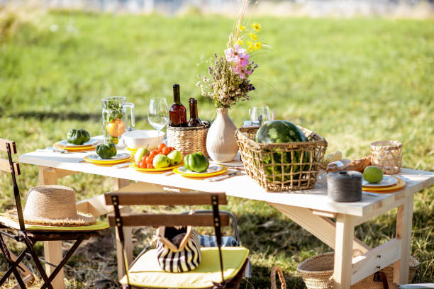 istock Beautifully decorated lunch table in the garden 1166574202
