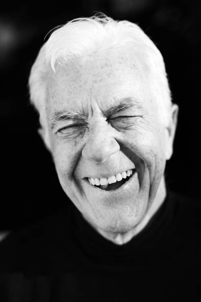 istock Laughing senior man in black-and-white portrait 1166574240