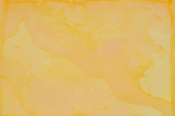 istock orange ink watercolor painted on paper  background texture 1166574852