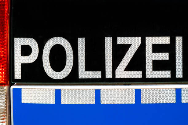 istock Polizei sign on a German police car 1166575269