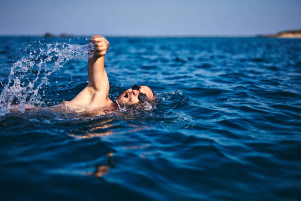istock Swimmer training on the open sea / ocean. 1166576213