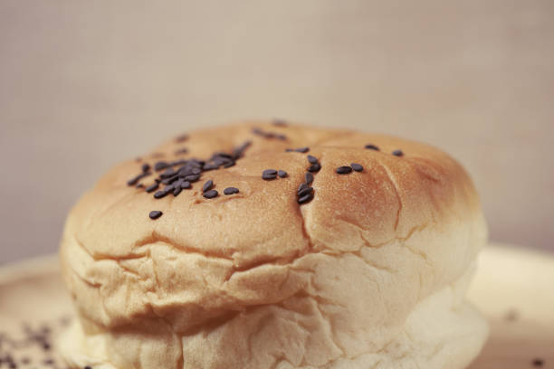 istock burger bun with Black sesame seeds 1166578062