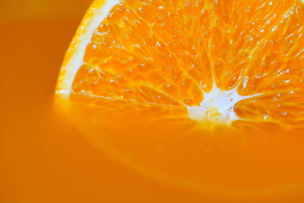 istock Slice of fresh orange fruit in orange juice 1166578121