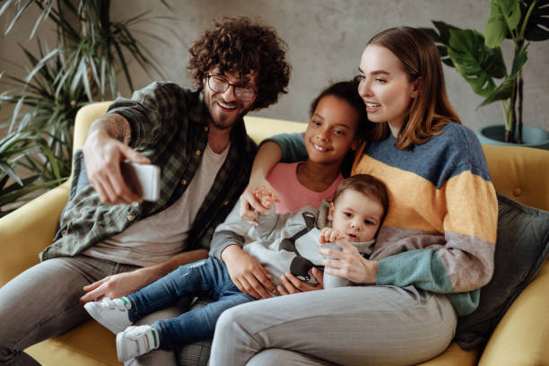 istock Happy family making selfie 1166579123