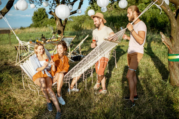 istock Friends relaxing with drinks in the garden 1166580931