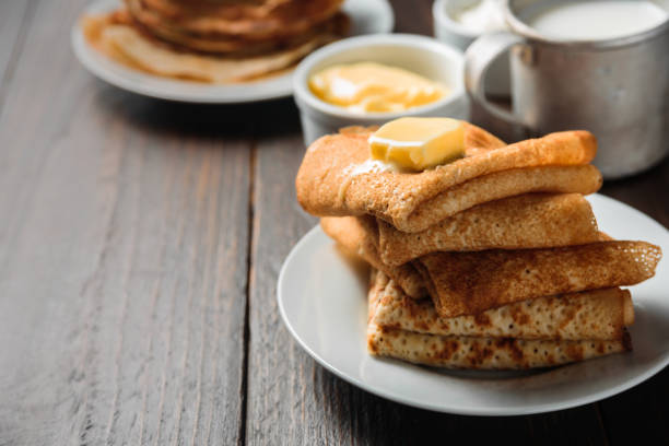 istock Russian pancakes blini with piece of butter 1166581943
