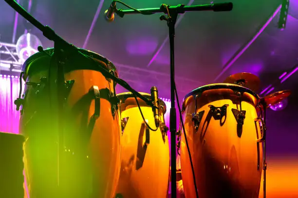 Photo of Conga drum instrument with colored background